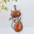 Silver cat pendant with sparkling goldstone crystal and cute tail detail on white background - With Leather Cord / Gold Sandstone