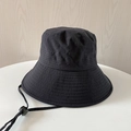 Detail of black bucket hat showing water ripple texture and adjustable windproof cord - M (56-58cm) / Black