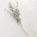 Dettaglio di rami artificiali argentati glitterati per decorazioni natalizie fai da te - Argento