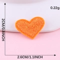 Self-adhesive bright orange heart embroidery patch with fine twill texture and 2.6cm width - Hot Melt Adhesive / Orange