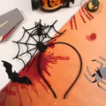 Halloween headband featuring a black spider and web design on a festive background - Spider Web Headband