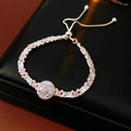 Macro shot of silver adjustable bracelet with pink and white zircon stones and box chain - Pink White Silver (Adjustable Bolo)