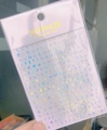 Macro shot of 3D holographic silver alphabet nail sticker WG719 with metallic finish - Laser Silver (WG719)