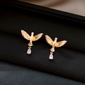 Golden bird stud earrings with a clear teardrop crystal pendant in a black jewelry box - 43# Flying Bird Zircon Pendant (43# S925 Post-Gold)