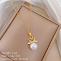 Detail view of swan pendant necklace with pearl and zirconia on white silk background - A513 Titanium Steel Chain Copper Pendant