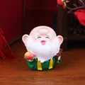 Cartoon Longevity God Harzfigur mit Langlebigkeits-Pfirsich für die Tischdeko - Langlebigkeitsgott-Ornament