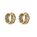 Detail of gold hoop earrings with micro-paved black and clear cubic zirconia leopard pattern - Wide Full Diamond Leopard / Gold
