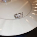 Close-up of silver zircon horse ring with cross-weave design and small crystals - Silver Layered Cross (12#)