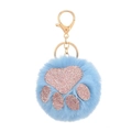 Detail of sky blue faux fur ball keychain with pink sequin cat paw and gold clasp - 8cm / Sky Blue
