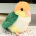 Cute colorful parrot plush keychain with orange hanging strap on white keyboard - Charm / Green