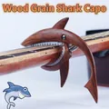 Shark-shaped guitar capo in dark wood grain finish with protective white silicone padding - Blister Packaging / Wood Grain