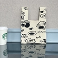 Knitted tote bag featuring black and white dog illustration and artistic text patterns - Beige Hat With Puppy Design