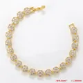 Detail view of flower cluster gold chain bracelet with white cubic zirconia stones - Gold White Zirconia Bracelet (VL527)