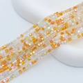Vista macro di perle a cubo da 2mm in vetro di cristallo sfaccettato per gioielli DIY - Multicolore 5 (Caldo Vibrante)
