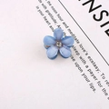 Mini light blue flower hair claw with matte petals and centered sparkling rhinestone - Crystal Flower (Blue)