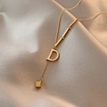 Golden titanium steel necklace with a prominent letter D pendant on champagne silk - Titanium Steel Gold Style (X536)