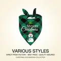 Close-up of Christmas pet bandana with green plaid pattern and snowman illustration - Blue Buffalo Plaid Snowman