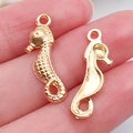 Golden seahorse charm pendants in KC gold finish for DIY jewelry making accessories - Seahorse Pendant 7x23mm
