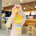Astronaut quicksand bottle keychain with yellow star charm and bubble handle strap - Dried Flower Shaker Ball - Yellow