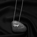 Silver Virgo constellation necklace with retro art font on a black silk background - Virgo Steel