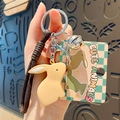 Cute cream rabbit keychain with woven strap and small bell accessory - Cream Yellow Rabbit