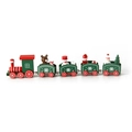 Close-up of wooden Christmas train with miniature bear, snowman and festive tree details - Red Green