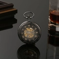 Vintage black mechanical pocket watch with ornate floral engraving and skeleton dial - Semi-Automatic Mechanical / Black