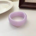 Minimalist light purple resin wide bangle with irregular artistic design and smooth finish - Violet