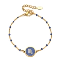 Detailed view of Scorpio zodiac charm bracelet in gold stainless steel and blue enamel - Stainless Steel / Scorpio-Royal Blue
