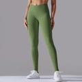 Close-up of seamless light green yoga pants featuring a slimming V-shaped cross waist design - Army Green