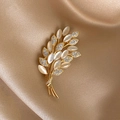 Elegant gold wheat brooch with opal and rhinestones on luxury champagne silk background - Gold Cat's Eye Wheat Brooch