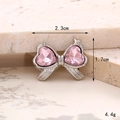 Detail of pink crystal bow shoe charm accessory with 2.3cm measurement and silver finish - Double Heart Small Tie Pink