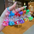 Lot de six porte-clés licorne colorés avec sable mouvant, paillettes et petites cloches - Style Fermoir Mousqueton / Style licorne flash multicolore (Mélange aléatoire)