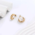 Macro shot of 18K gold plated U-shaped earrings with intricate diamond-grid texture detail - C-Shape Net Texture