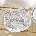 Waterproof baby feeding bib with grey polka dots, wing sleeves and a crumb catcher pocket - Wings Around - Spotted Ears / One Size
