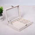 Detail of velvet jewelry box with glass lid, ring slots and silver metal buckle closure - 20*15*5 / White