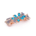 Detail of rose gold butterfly hair clip with shimmering blue and white crystals - Style A / Blue