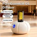 Waterless essential oil diffuser with pumpkin design showing mist and LED indicator - Pumpkin White Sensor Aromatherapy Machine