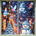 Blue Christmas window static stickers featuring snowman, gnome, and snowflakes on glass - 2-Pack Set BQ534+535