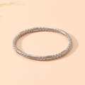 Detailed macro view of silver beaded bracelet with textured cylinders and smooth beads - Steel Bead & Textured Column Style (S504)