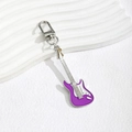 Macro view of purple enamel electric guitar keychain with silver metal lobster clasp - Purple