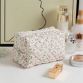 Quilted floral makeup bag in white with pink flowers and diamond stitching pattern - Pink Floral