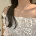 Baroque style pearl necklace with silver hollow circular diamond pendant on a model - Korean Circle Zircon Necklace