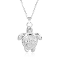 Detailed close-up of a stainless steel sea turtle pendant with embossed floral patterns - Pendant Necklace / Steel