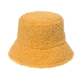 Detail of bright yellow faux lambswool bucket hat showing soft curly plush texture - Yellow