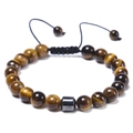 Macro detail of natural tiger eye beads and adjustable braided cord on a beaded bracelet - Tiger Eye Bracelet