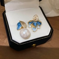 Detail of asymmetric pearl and blue enamel flower earrings in a velvet jewelry box - Silver Needle Pearl Stud Earrings (Real Gold Plated) - Blue (12#)