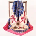 Rose red vintage silk scarf with carriage print and baroque patterns hanging on gold rack - 90*90cm / Rose Red