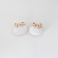 Macro detail of two cream plush cat patches with cute embroidered facial features - Pudding Cat Beige