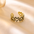 Vintage gold plated heart open ring with black enamel inlay in a luxury aesthetic - Gold-Black Heart